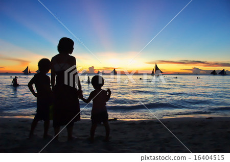 Families looking at sunset on Boracay Island 16404515
