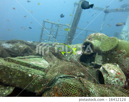 massive shipwreck, sits on a sandy seafloor  bali 16412128