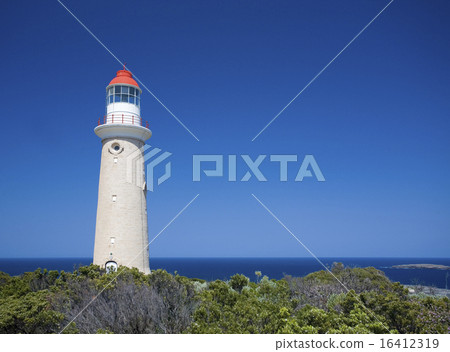 Lighthouse against clear blue sky Lighthouse against clear blue sky 16412319