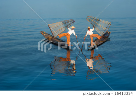Burmese fisherman catching fish in traditional way Burmese fisherman catching fish in traditional way 16413354