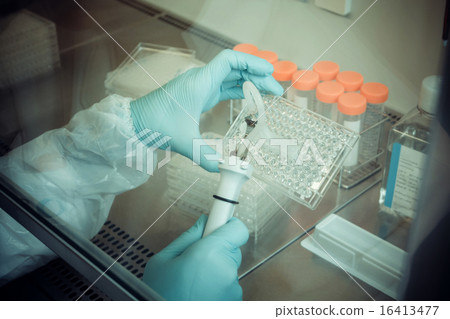 Laboratory technician working, multiwell pipette 16413477