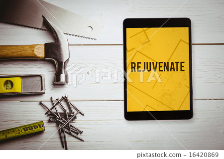Rejuvenate against digital tablet displaying blueprint Rejuvenate against digital tablet displaying blueprint 16420869