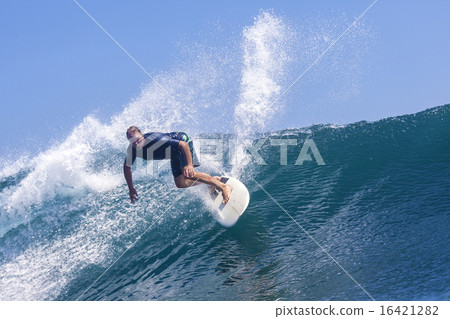 Surfer on Amazing Blue Wave Surfer on Amazing Blue Wave 16421282
