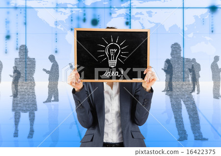 Composite image of businesswoman showing board 16422375