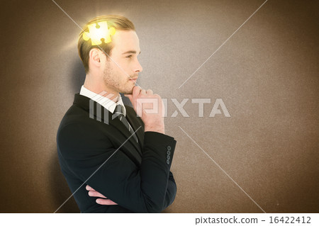 Composite image of thinking businessman standing with hand on ch Composite image of thinking businessman standing with hand on ch 16422412