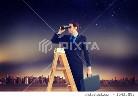 Composite image of businessman looking on a ladder Composite image of businessman looking on a ladder 16423892