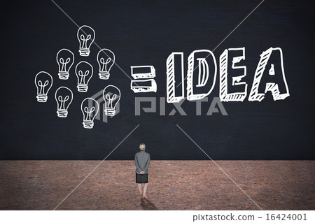 Composite image of businesswoman standing with hands behind back 16424001