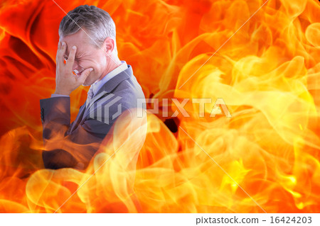 Composite image of businessman with headache Composite image of businessman with headache 16424203
