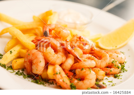 shrimps with french fries potatoes 16425884