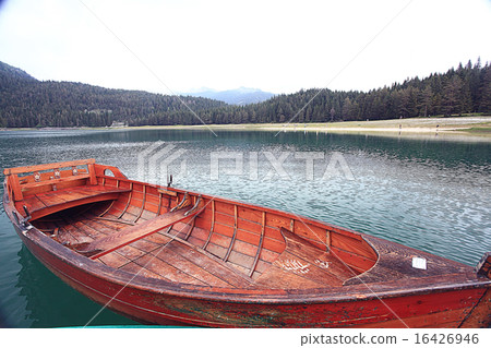 wooden boat on a mooring mountain lake 16426946