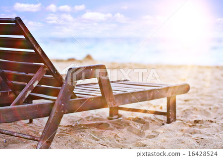 sandy beach sunbeds umbrellas sea 16428524