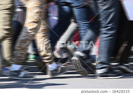 People crowd walking back foot blurred background 16428535