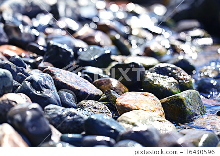 colorful pebbles pebbles on the beach 16430596