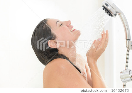 Stock Photo: Woman enjoying a shower