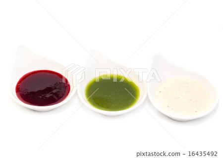 sauces on a white background in the restaurant 16435492