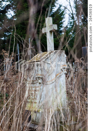 Old cemetery marble gravestone with the cross 16436919