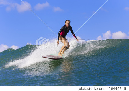 Surfer girl on Amazing Blue Wave 16446246