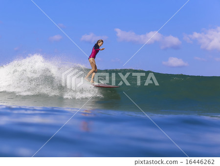 Surfer girl on Amazing Blue Wave 16446262