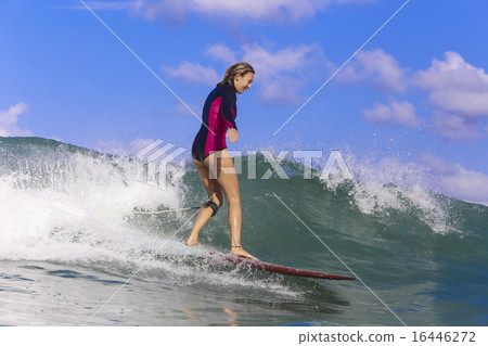 Surfer girl on Amazing Blue Wave 16446272