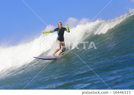 Surfer girl on Amazing Blue Wave 16446315