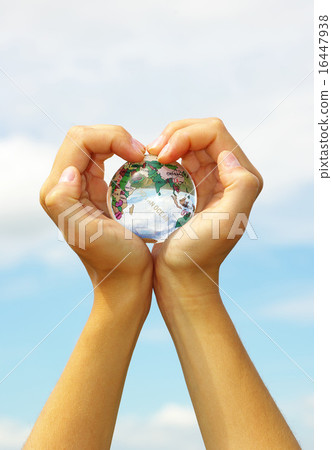 globe in hands globe in hands 16447938