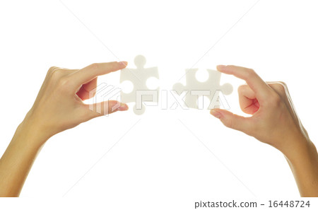 puzzle in hands 16448724