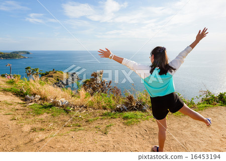 Woman looking ocean views and expressions of joy 16453194