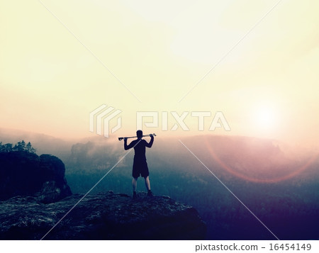 Tourist with poles in hands, melancholic morning. 16454149