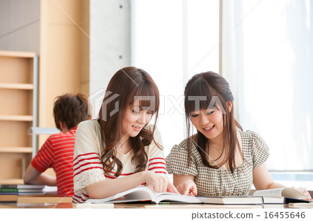 Female college studying at university library 16455646