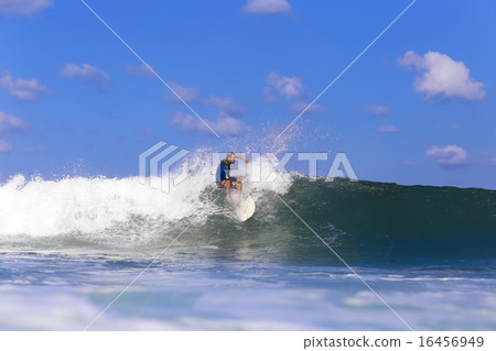 Surfer on Amazing Blue Wave 16456949