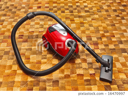 Vacuum cleaner on carpet 16470997