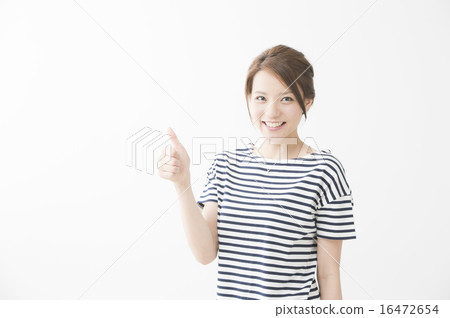 A woman making a gesture (like) 16472654