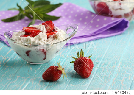 strawberries with cream in a bowl of glass strawberries with cream in a bowl of glass 16480452