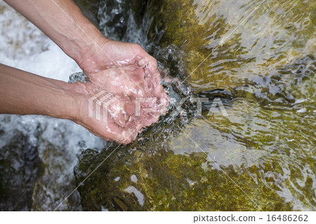 Man's hands with water splash Man's hands with water splash 16486262