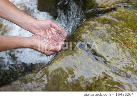 Man's hands with water splash 16486264