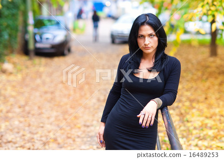 attractive woman outside in the park 16489253