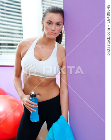 fit woman with energy drink fit woman with energy drink 16489648