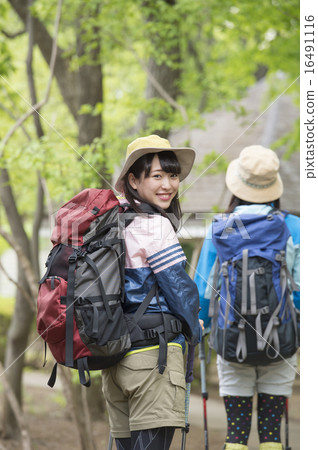 A young woman climbing A young woman climbing 16491116