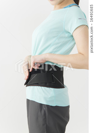 A woman who plays a corset 16491685