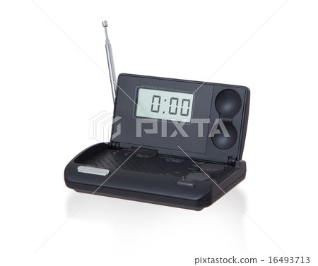 Old digital radio alarm clock isolated on white Old digital radio alarm clock isolated on white 16493713