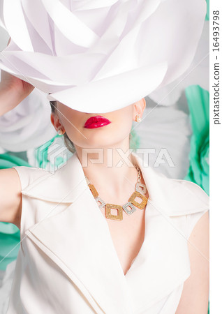 Pretty girl in fashionable dress with large paper Pretty girl in fashionable dress with large paper 16493798