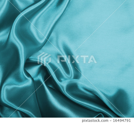 Smooth elegant blue silk or satin as background 16494791
