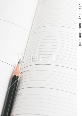 Schedule book and pencil 16498347