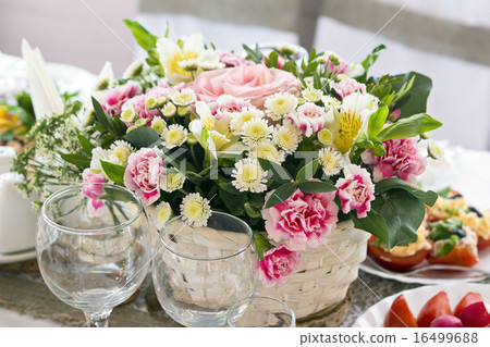 Festive bouquet of flowers on the table Festive bouquet of flowers on the table 16499688