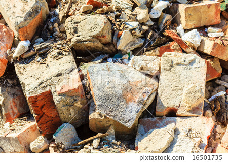 Construction site. Closeup stack of old bricks. 16501735