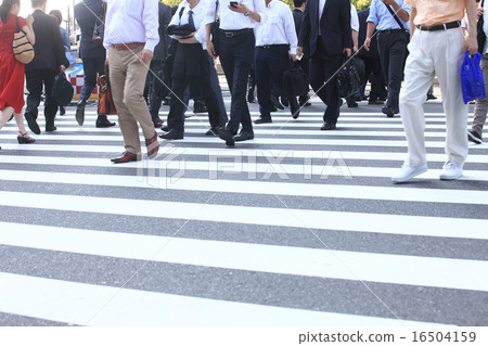 Image of businessman image walking in crowd of city 16504159