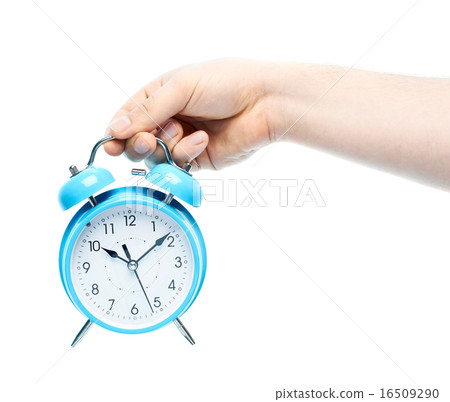 Caucasian male hand holding alarm clock 16509290