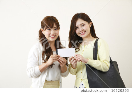 A woman with a premium gift certificate 16520293
