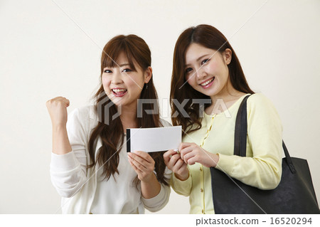 A woman with a premium gift certificate 16520294