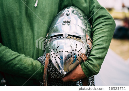 Knight Helmet Of Medieval Suit Of Armour On Table Knight Helmet Of Medieval Suit Of Armour On Table 16523731